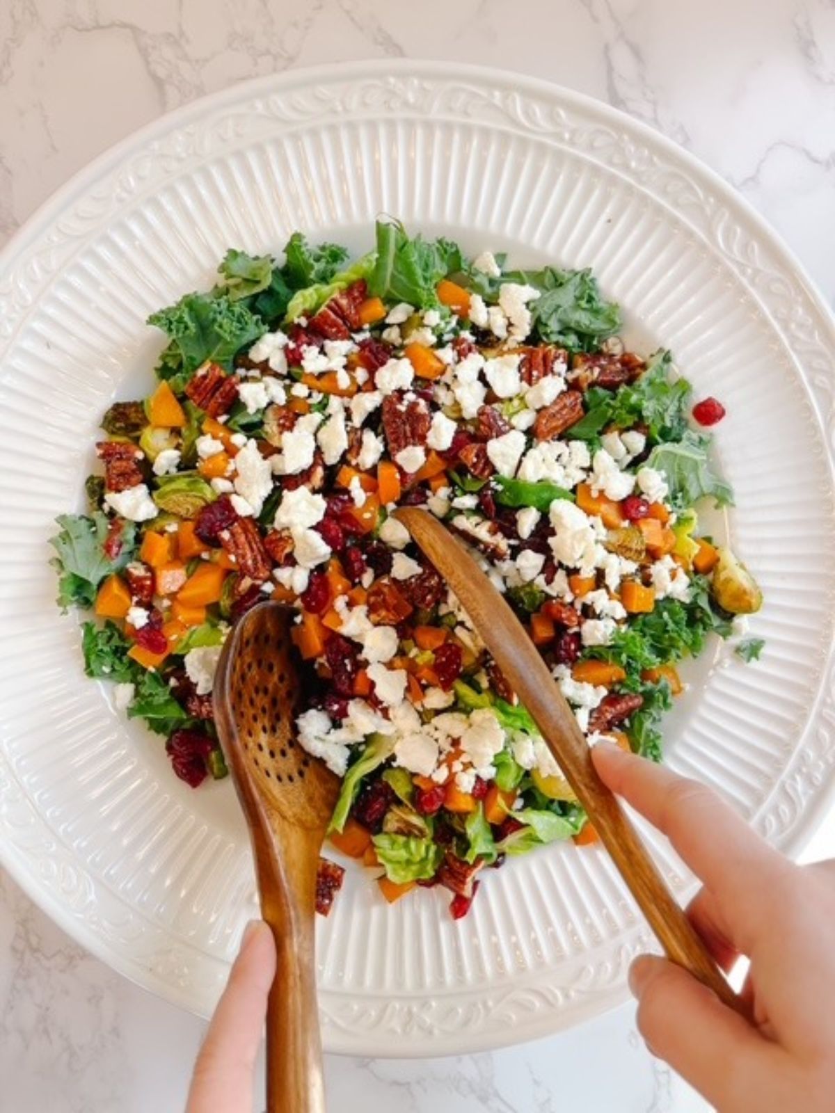 serving the kale and sweet potato salad