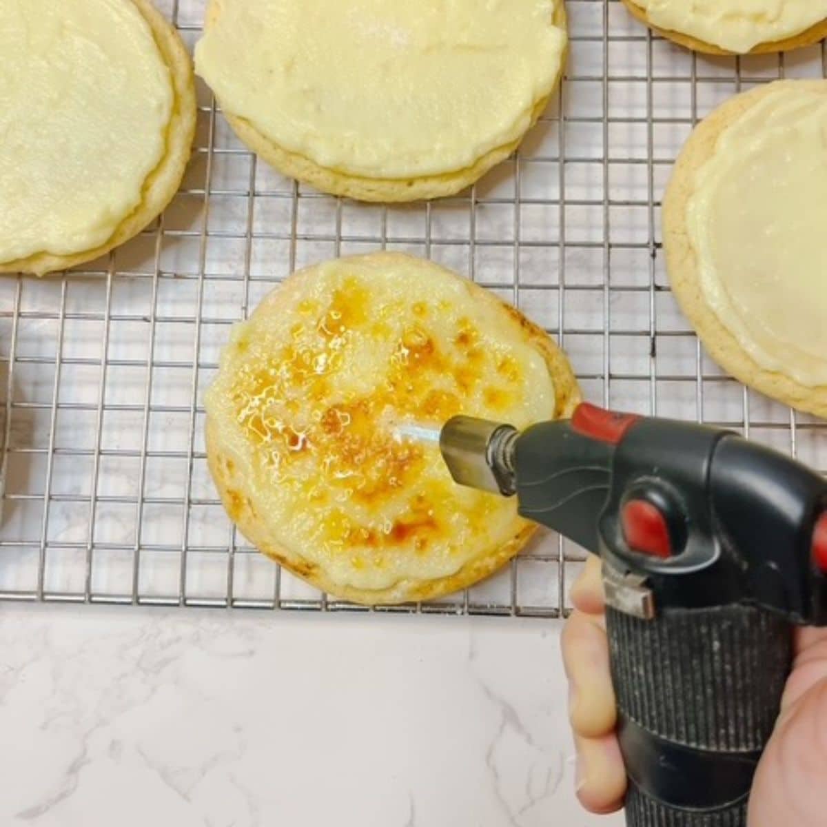 Just before serving, torch the sugar topping of the cookie