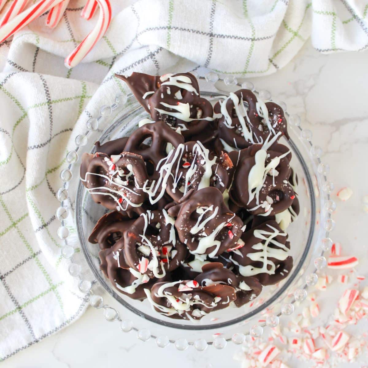Use chocolate dipped pretzels once they are frozen and set.