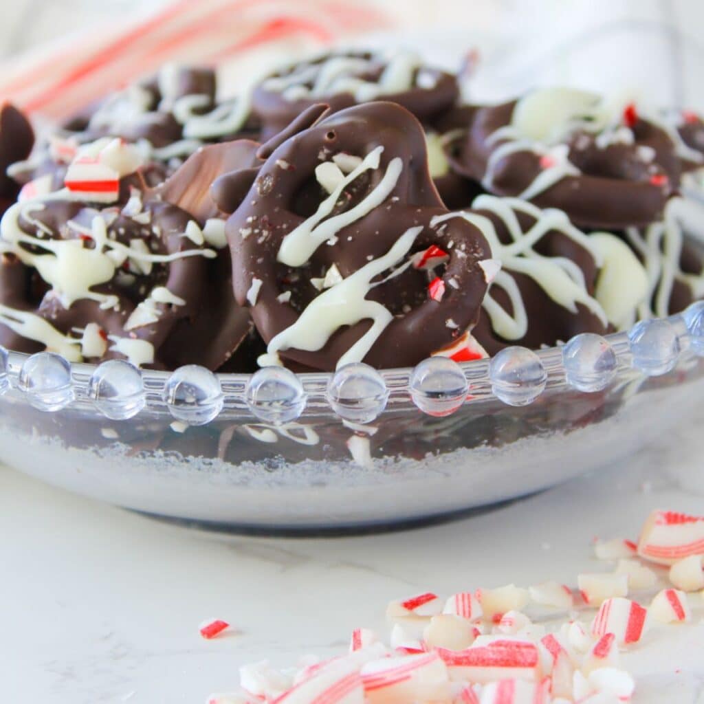 Serve chocolate dipped pretzels once they are set and dried.