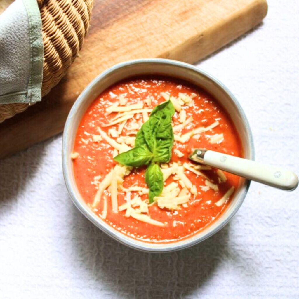 A bowl of roasted tomato basil soup.