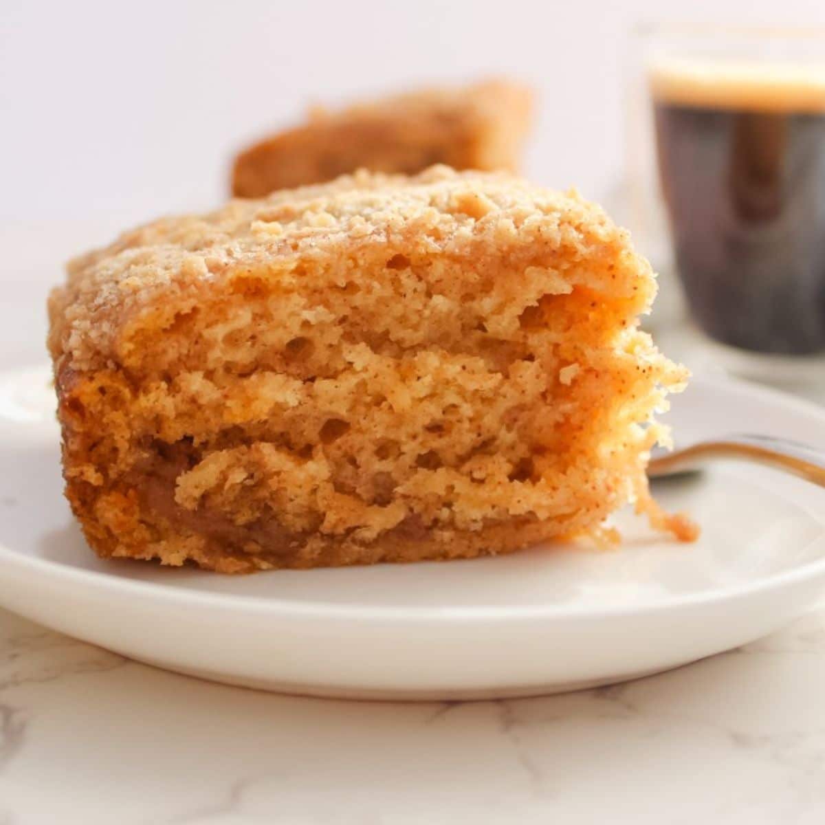 coffee cake with coffee in the background