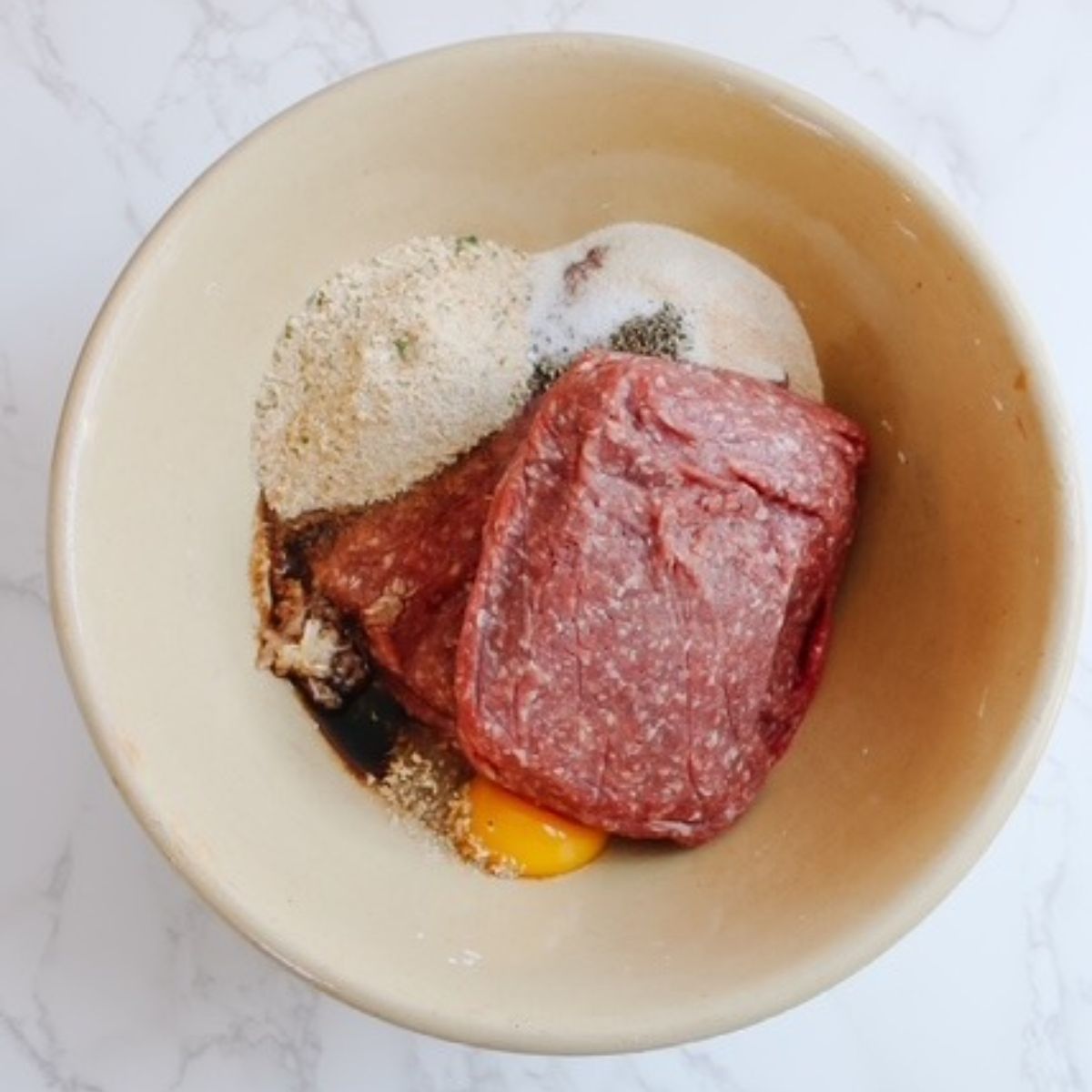 Add patty ingredients into a medium sized bowl
