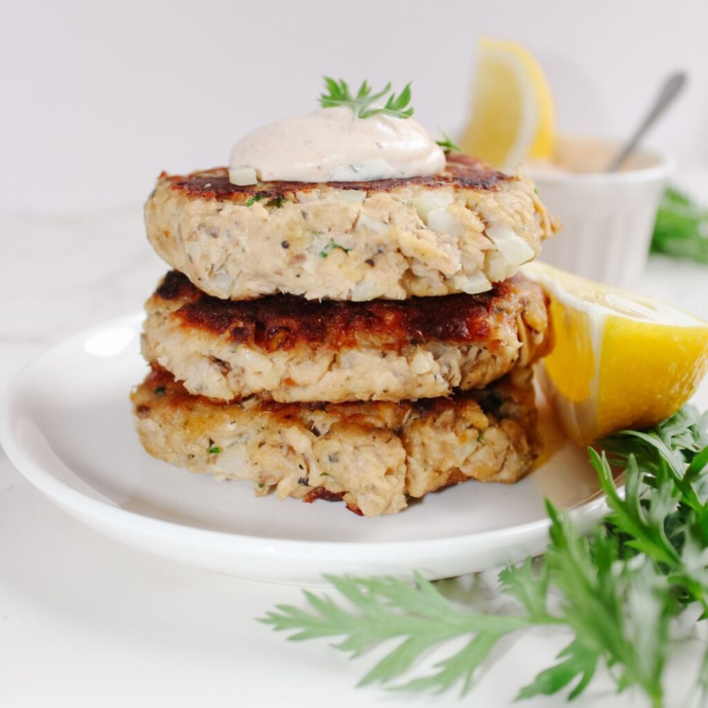 Salmon patties are delicious when served with homemade salmon sauce!