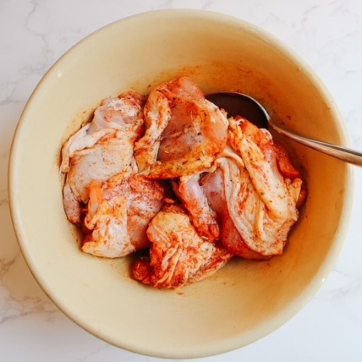 season the chicken and stir to combine