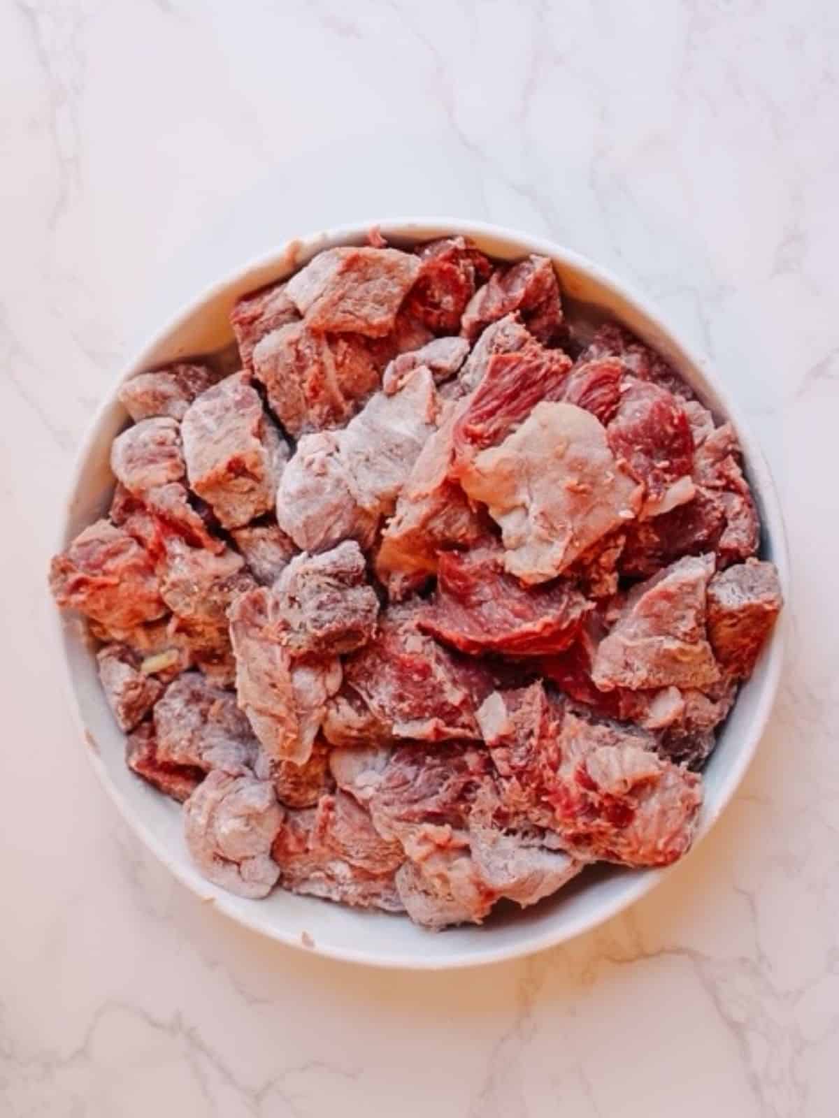 Coat the beef in flour