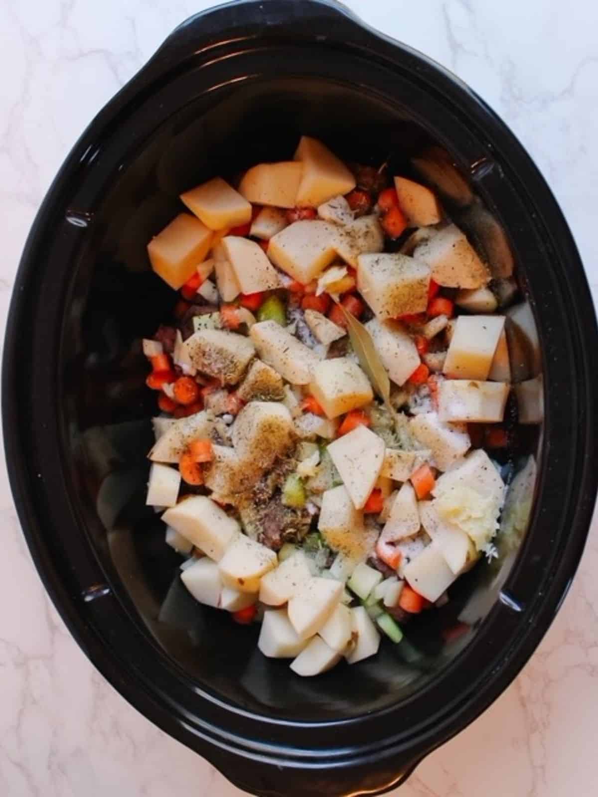 add seasonings into crockpot