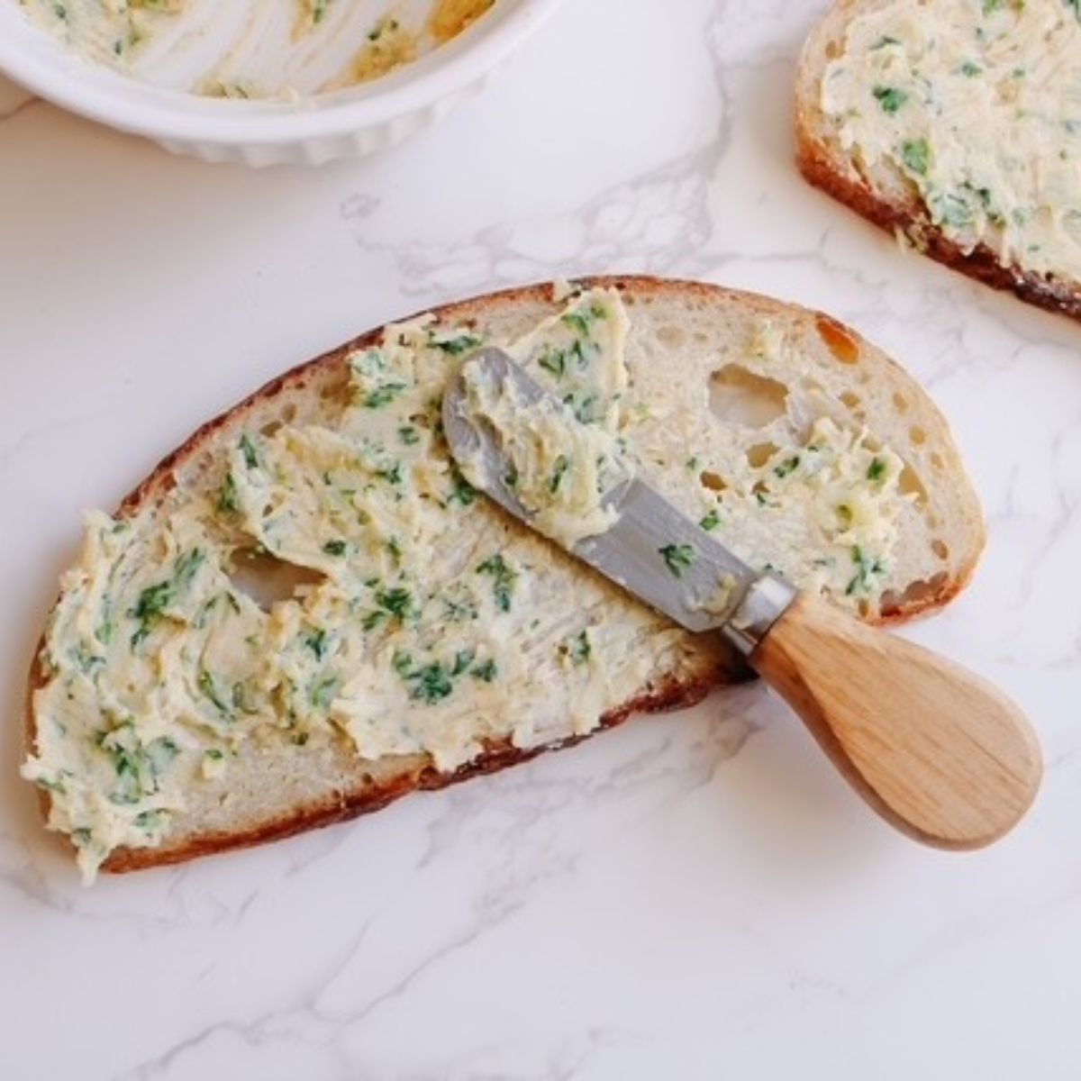 spread butter mixture on sliced bread