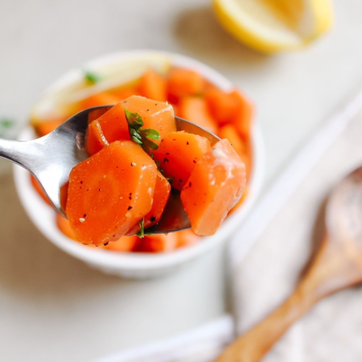 steamed carrots on a spoon