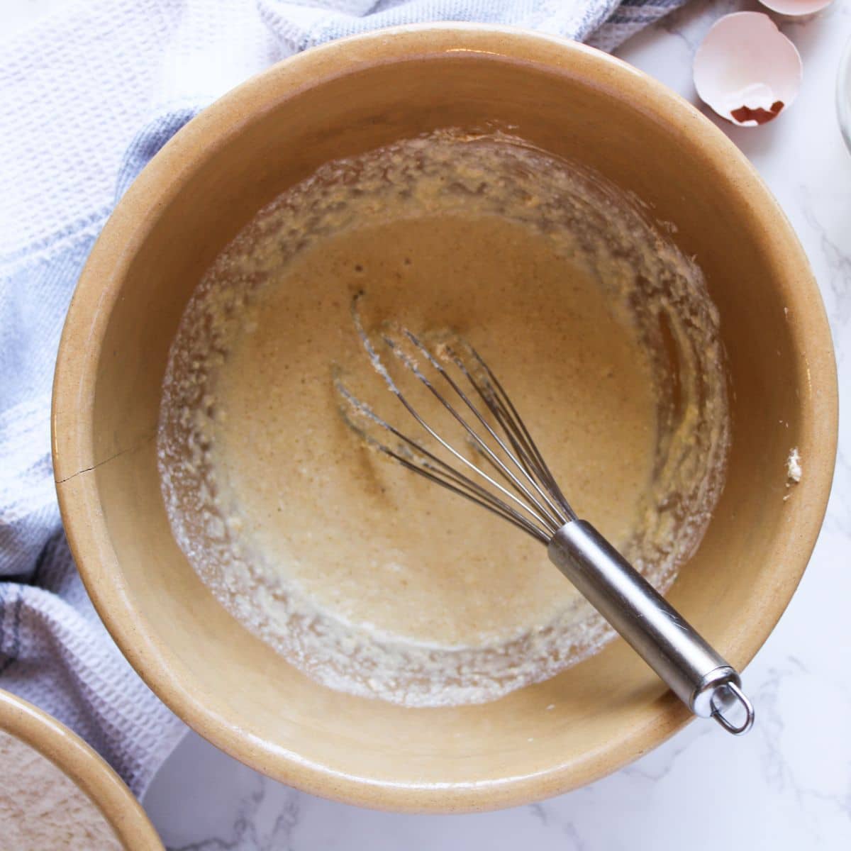The mixture should be smooth like this-this is a large mixing bowl with the sourdough strawberry shortcake wet ingredients just mixed with a whisk.