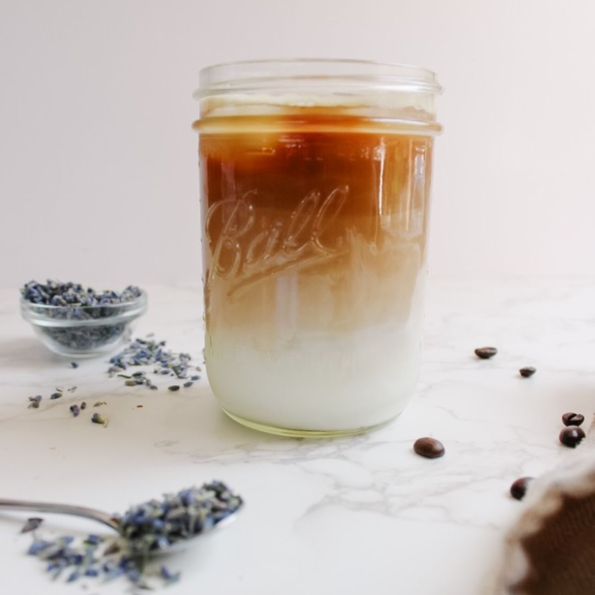 iced lavender latte with milk and coffee layer