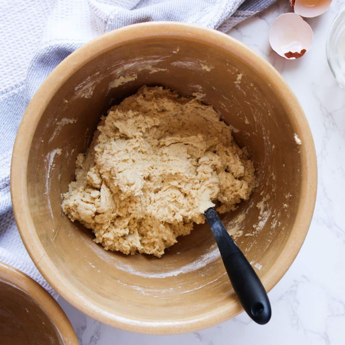 The sourdough strawberry shortcake ingredients should create a thick dough.