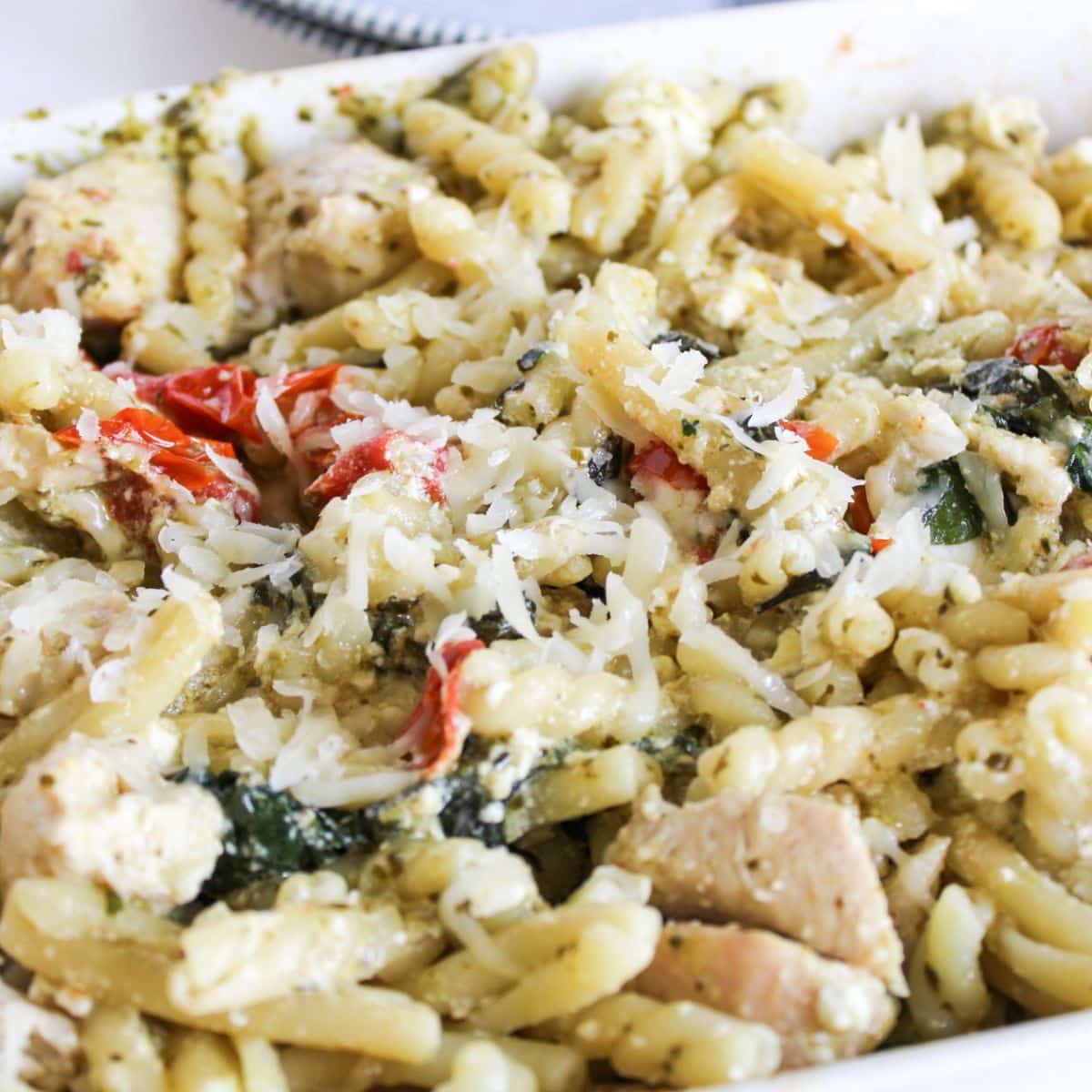 Chicken feta pasta topped with freshly grated parmesan