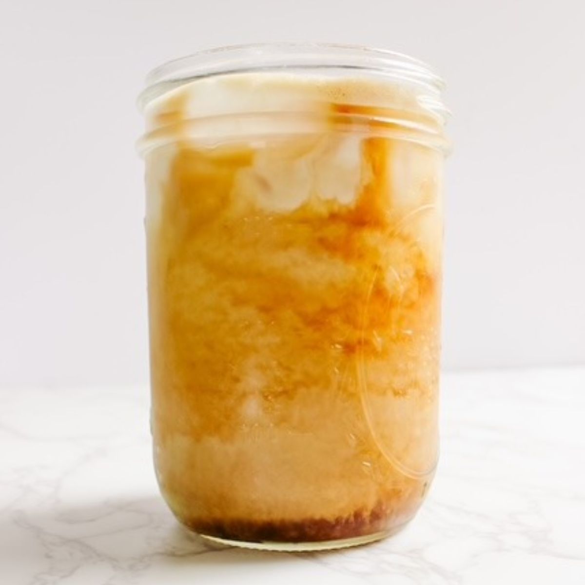 Add in milk to the latte