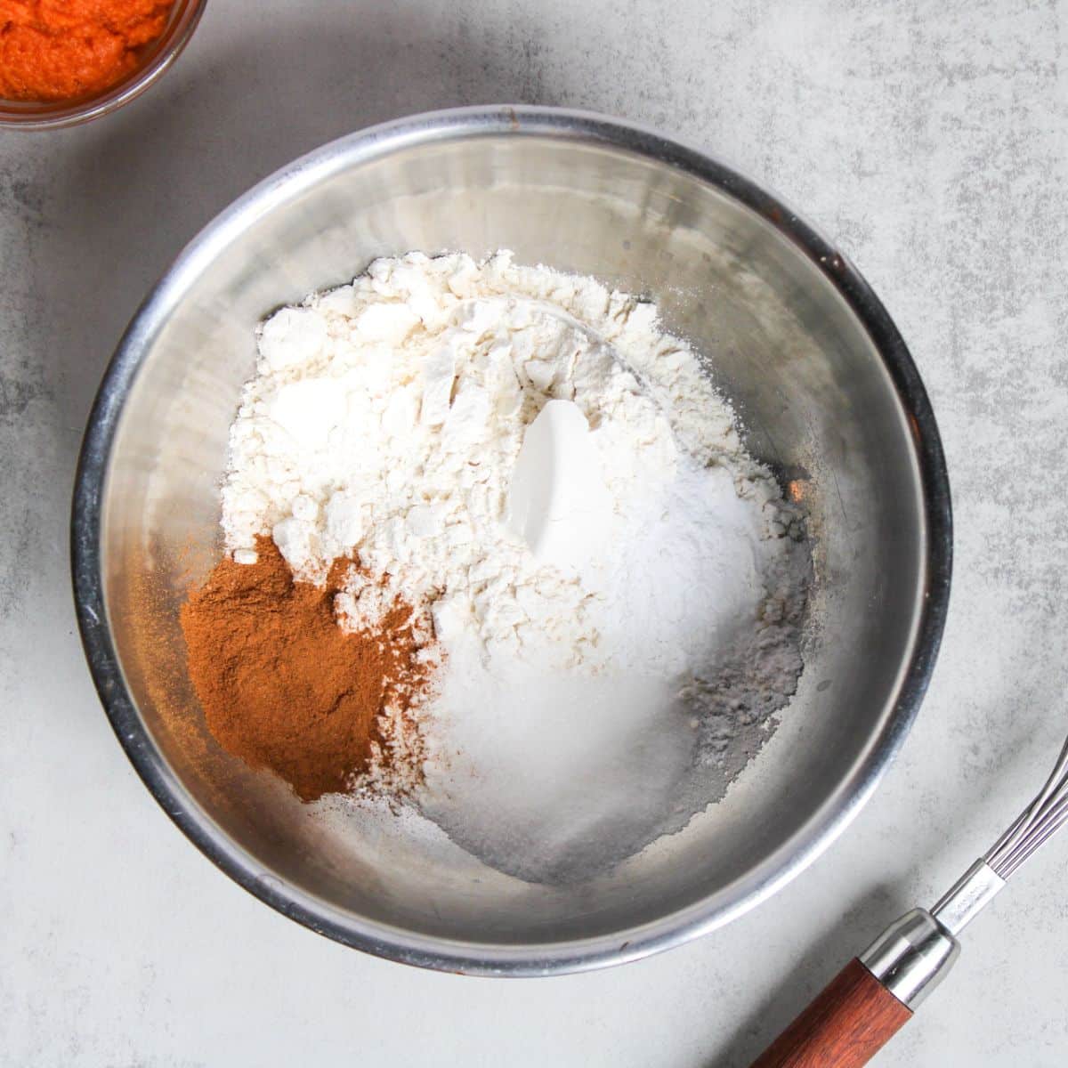 Add the dry ingredients into a large mixing bowl.