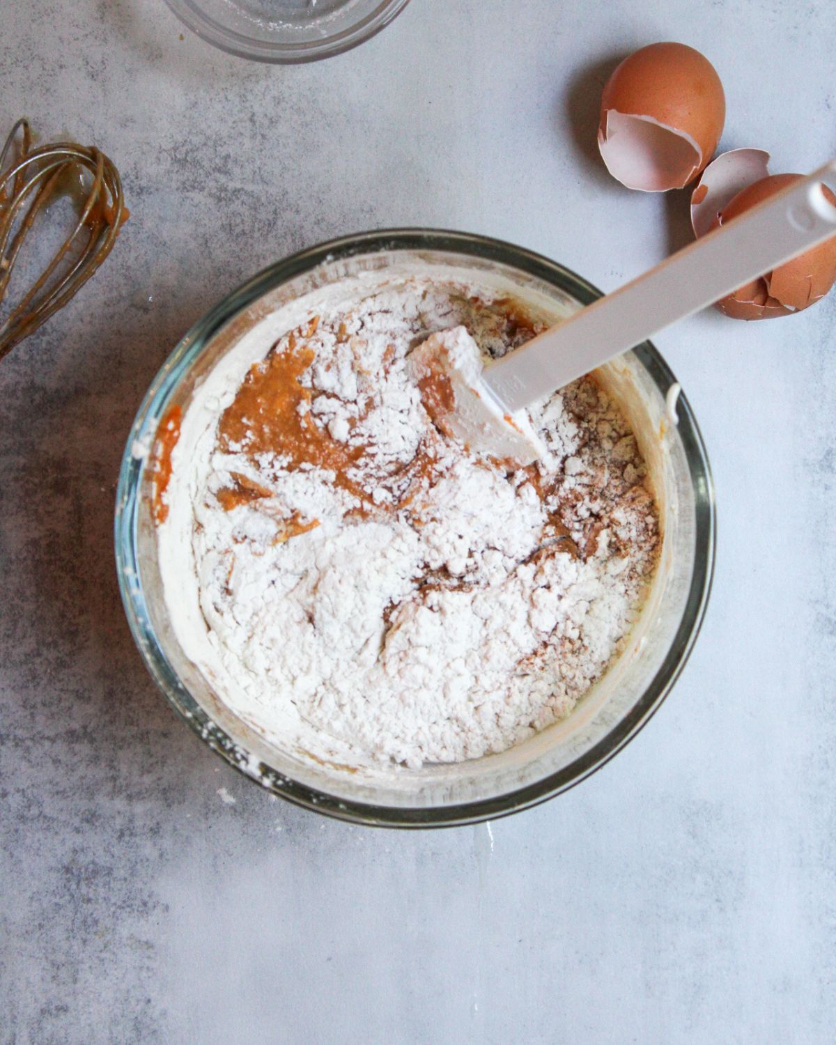 Add the dry ingredients to the wet ingredients and gently mix using a spatula.